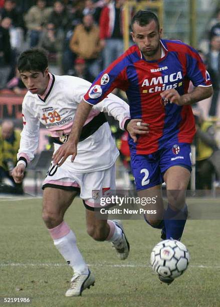 Cristian Zaccardo of Palermo and Daniele Daino of Bologna in action during the Serie A match between Bologna and Palermo at the Renato Dall'Ara...