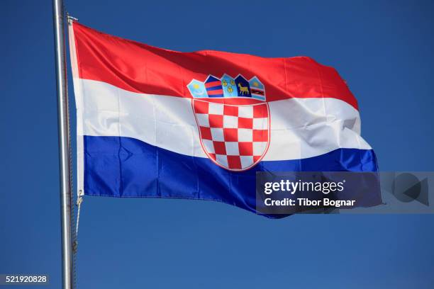 croatian national flag - kroatie stockfoto's en -beelden