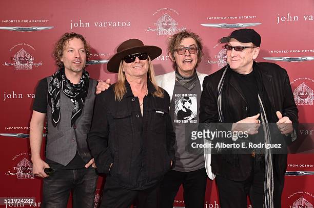 Recording artists Daxx Nielsen, Robin Zander, Tom Petersson and Rick Nielsen of music group Cheap Trick attend the John Varvatos 13th Annual Stuart...