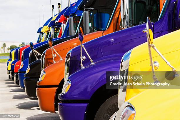 parked cargo trucks - fleet of vehicles stock pictures, royalty-free photos & images