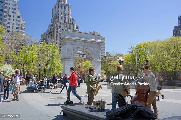 music in washington square park - washington square park stock pictures, royalty-free photos & images