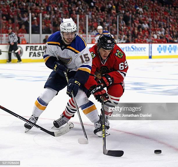 Andrew Shaw of the Chicago Blackhawks and Robby Fabbri of the St. Louis Blues battle for the puck in Game Three of the Western Conference...