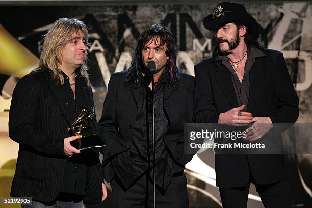 Lemmy Kilminster, guitarist Phillip Campbell and drummer Mikkey Dee of metal band Motorhead accept the award for "Best Metal Performance" during the...