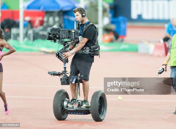 Camera operator with Steadicam Camera Stabilizing Systems