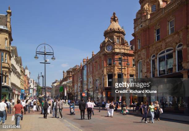 pedestrian street in briggate, leeds - high street stock pictures, royalty-free photos & images