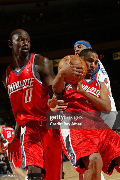 Steve Smith of the Charlotte Bobcats fights for a rebound against Jerome Williams of the New York Knicks on February 13, 2005 at Madison Square...