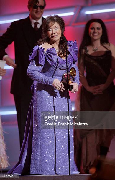 Singer Loretta Lynn accepts the award for Best Country Album for "Van Lear Rose" on stage during the 47th Annual Grammy Awards at the Staples Center...