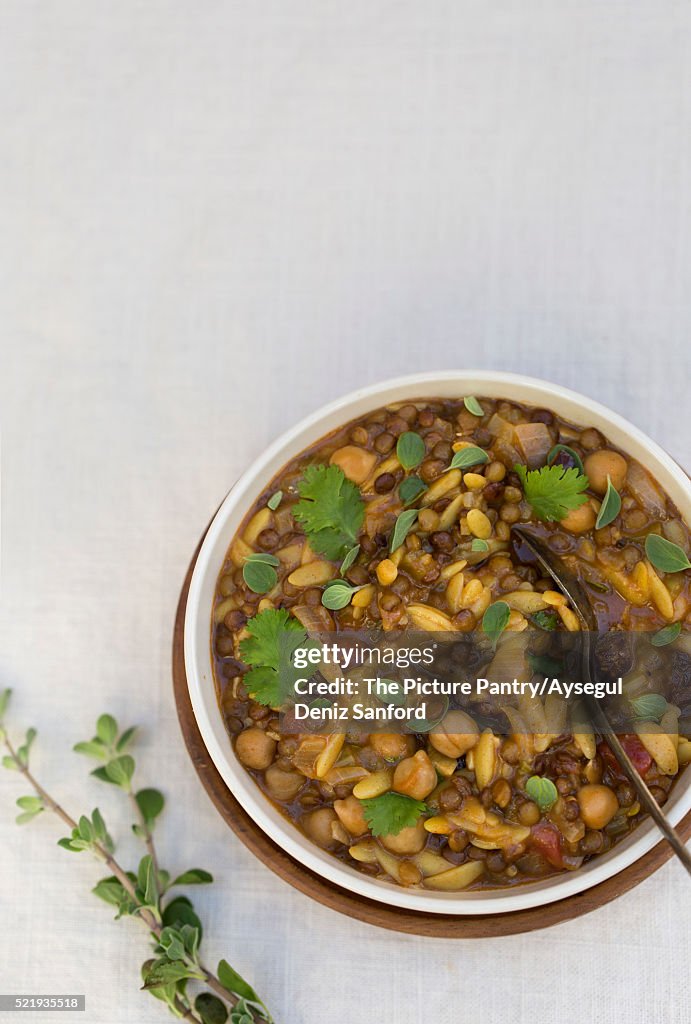 Harira - Indian Style Hearty Soup made with lentils, chickpeas, celery, ginger, tomatoes, and spices