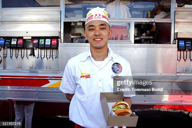 In-N-Out Burgers are served at the John Varvatos 13th Annual Stuart House benefit presented by Chrysler with Kids' Tent by Hasbro Studios at John...