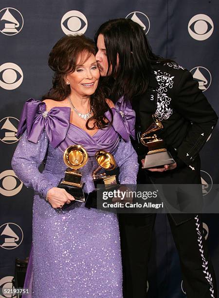 Loretta Lyne and Jack White pose backstage with their awards for "Best Country Collaboration With Vocals" during the 47th Annual Grammy Awards at the...