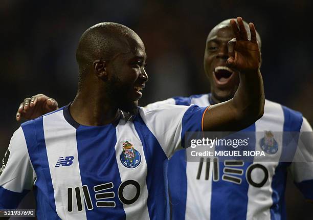 Porto's midfielder Danilo Pereira celebrates with teammate Dutch defender Bruno Martins Indi after scoring a goal during the Portuguese league...