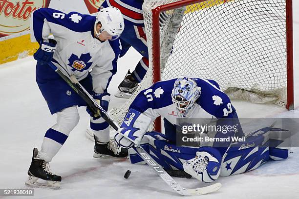 Marlies' goalie Garret Sparks makes the stop as Andrew Nielson looks on in AHL action in the second period between the Toronto Marlies and Rochester...