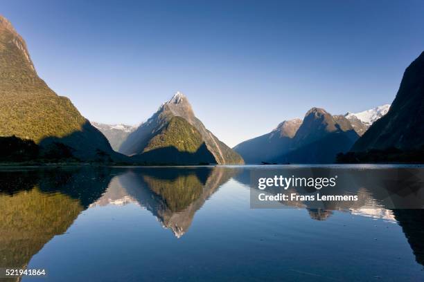 new zealand, south island, fiordland national park, milford sound. mitre peak (1692 meters). unesco world heritage site - milford sound stock pictures, royalty-free photos & images