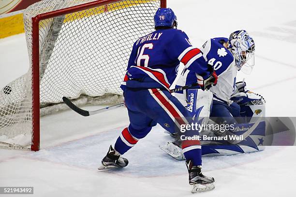 Marlies' goalie Garret Sparks can't make the stop against Americans' Cal O'Reilly in AHL action in the second period between the Toronto Marlies and...