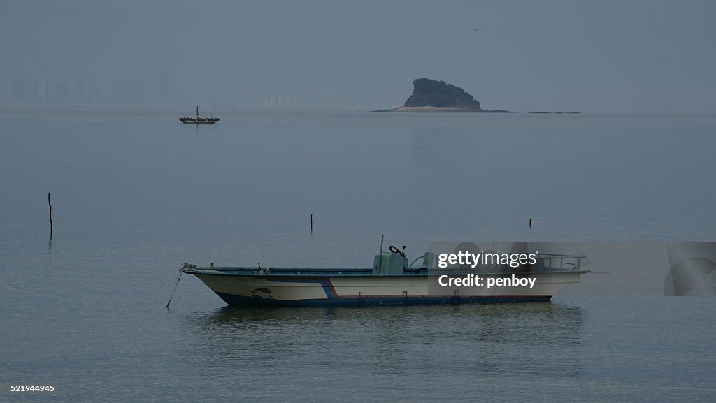 Island and two boat