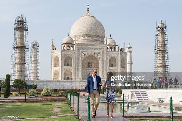 Prince William, Duke of Cambridge and Catherine, Duchess of Cambridge walk in front of the Taj Mahal on April 16, 2016 in Agra, India.