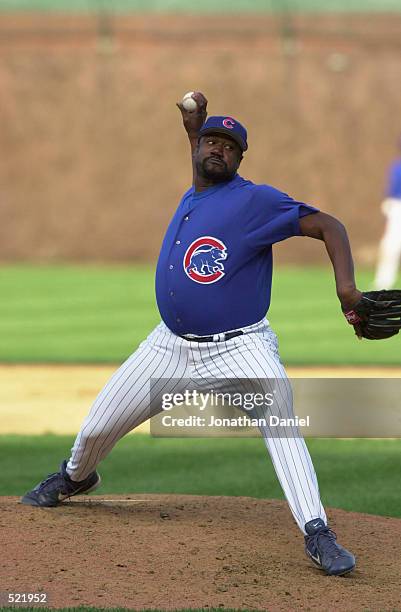 Pitcher Antonio Alfonseca of the Chicago Cubs throws a pitch during the MLB game against the Cincinnati Reds at Wrigley Field in Chicago, Illinois on...