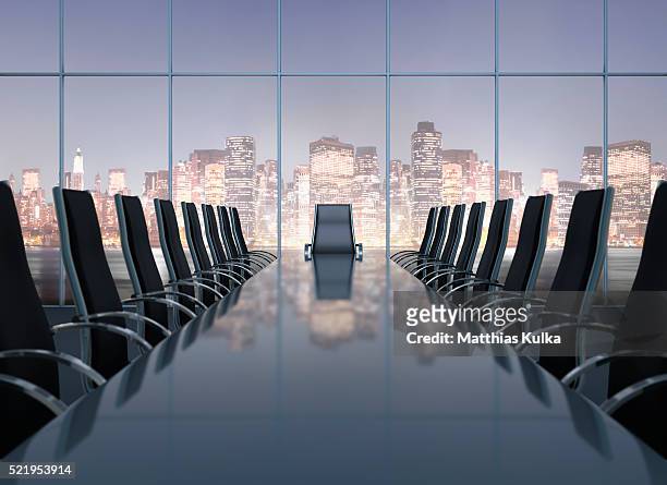 conference room with city skyline - konferenzraum stock-fotos und bilder