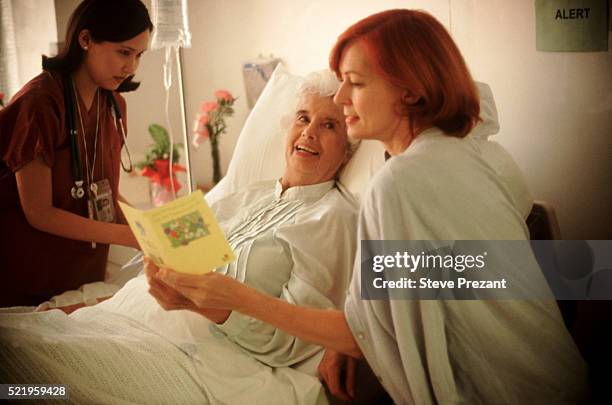 Patient Reading Reference 116 Hospital Patient Reading Card Stock Photos, High-Res Pictures, and ...