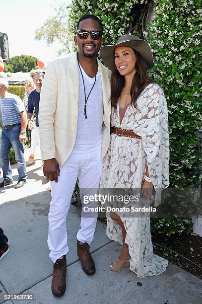 Actor Bill Bellamy and actress Kristen Baker Bellamy attend the John Varvatos 13th Annual Stuart House benefit presented by Chrysler with Kids' Tent...