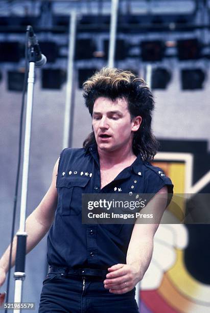 Bono performs during the War Tour at Pier 84 on June 29, 1983 in New York City.