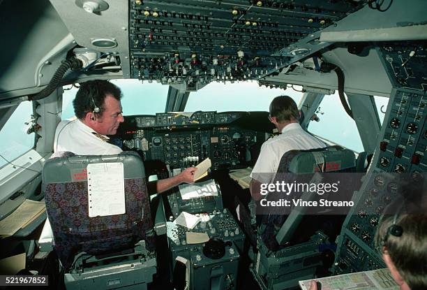 Pilots In Cockpit Of Boeing 747 High-Res Stock Photo - Getty Images