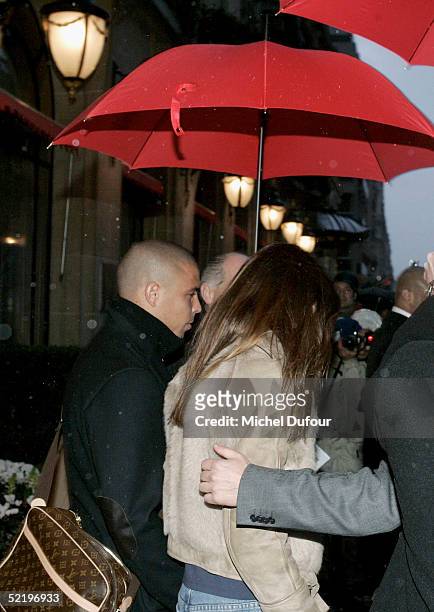 Brazilian footballer Ronaldo and fiance Daniela Cicarelli leave their Paris hotel, The Plaza, to attend their engagement party at Chantilly Chateau...