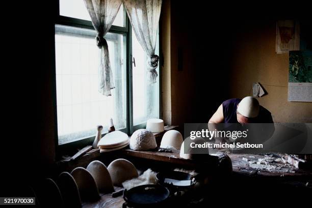 making traditional albanian hats - milliner stock pictures, royalty-free photos & images