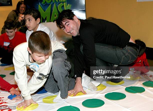 Actor Alan Cumming plays Twister as he takes part in a "Son of the Mask" event at The Children's Museum of Manhattan on February 14, 2005 in New York...