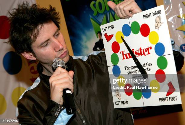 Actor Jamie Kennedy spins the Twister wheel as he takes part in a "Son of the Mask" event at The Children's Museum of Manhattan on February 14, 2005...