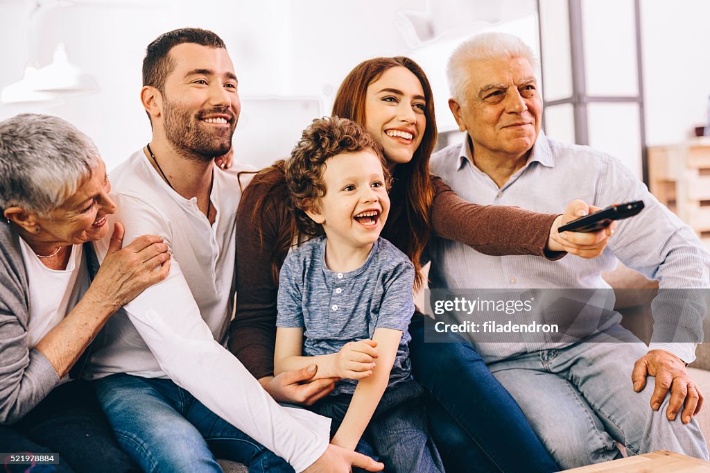 Family watching TV