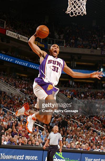 Shawn Marion of the Phoenix Suns dunks against the Utah Jazz on February 14, 2005 at America West Arena in Phoenix, Arizona. NOTE TO USER: User...
