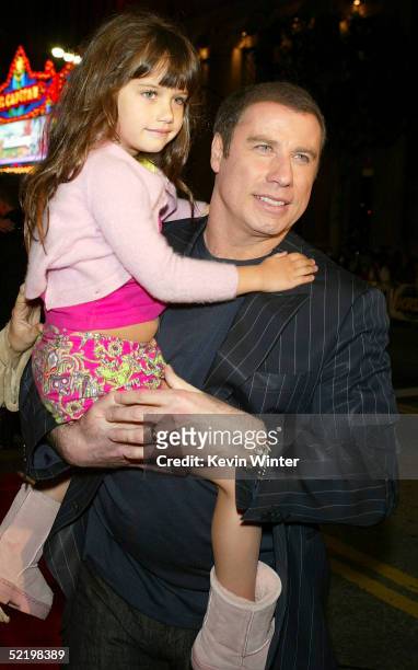 Actor John Travolta and daughter Ella Bleu walk on the red carpet during MGM's premiere of "Be Cool" at Grauman's Chinese Theatre on February 14,...