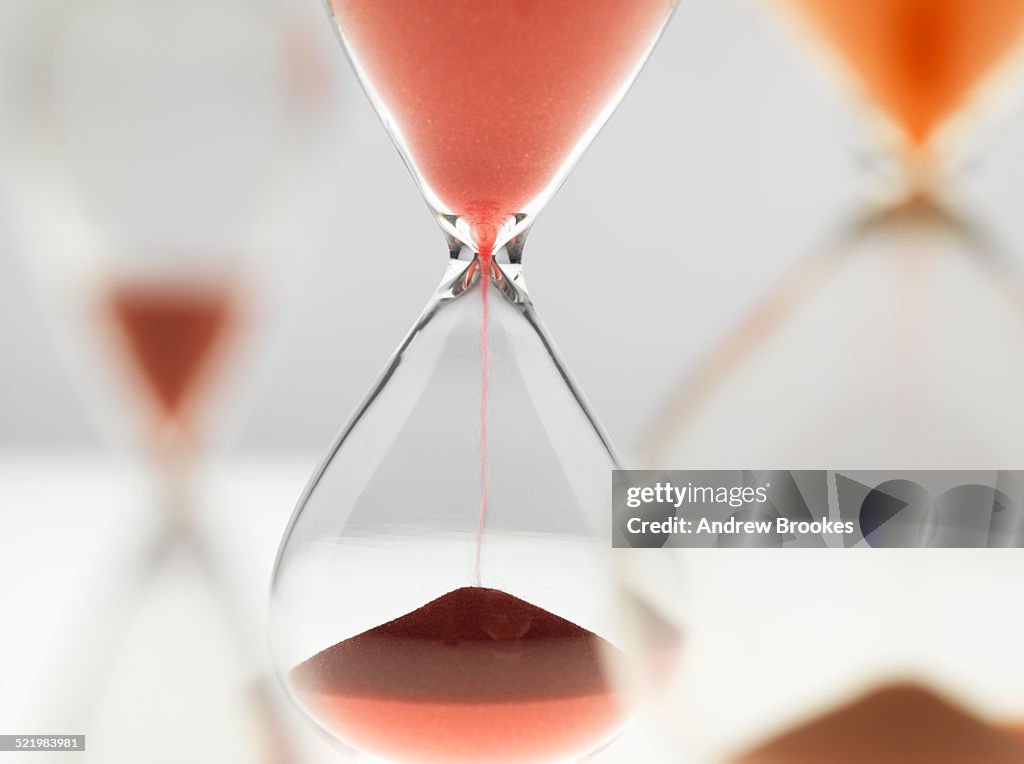 A variety of hour glass timers in use