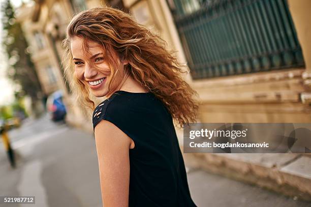 charming girl smiling - girl with beautiful hair stock pictures, royalty-free photos & images
