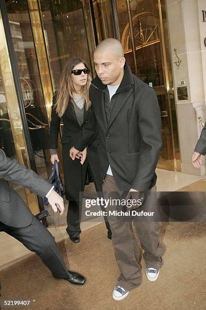 Brazilian footballer Ronaldo and fiance Daniela Cicarelli leave their Paris hotel, The Plaza, to go back to Barcelona on February 15, 2005 in Paris,...