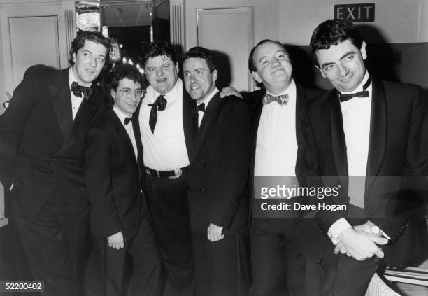 From left to right, the cream of British comedy - Stephen Fry, Ben Elton, Robbie Coltrane, Griff Rhys-Jones, Mel Smith and Rowan Atkinson, circa 1990.