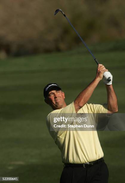 Tom Lehman hits a shot during the third round of the FBR Open on February 5, 2005 at the Tournament Players Club of Scottsdale in Scottsdale, Arizona.