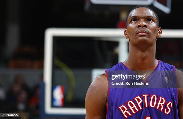 Chris Bosh of the Toronto Raptors glances up during the game against the Indiana Pacers at Conseco Fieldhouse on February 2, 2005 in Indianapolis,...