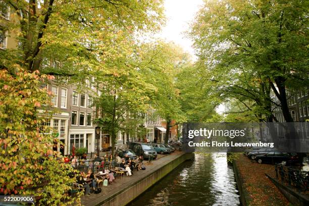 leliegracht canal in amsterdam - amsterdam cafe stock pictures, royalty-free photos & images