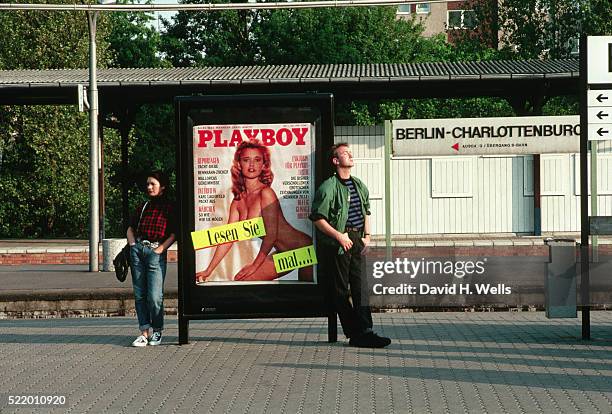 waiting at a train stop - west berlin stock pictures, royalty-free photos & images