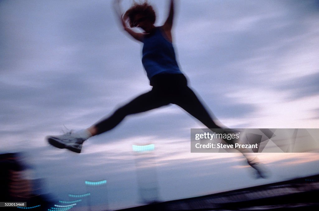 Leaping Example Picture Woman Leaping High-Res Stock Photo - Getty Images