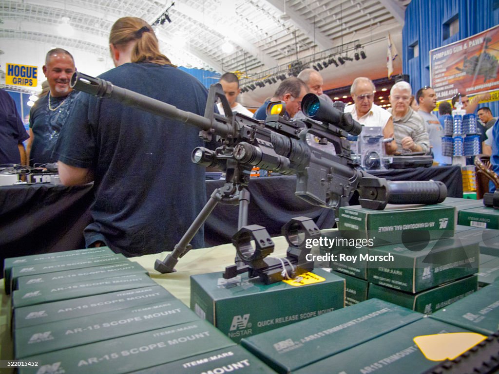 Semi-automatic Assault Rifle, AR-15 with Scopes for Sale at Gun Show