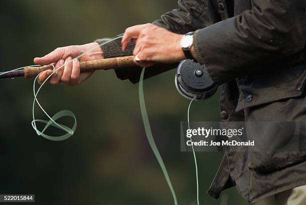 fly fishing - fishing reel stock pictures, royalty-free photos & images