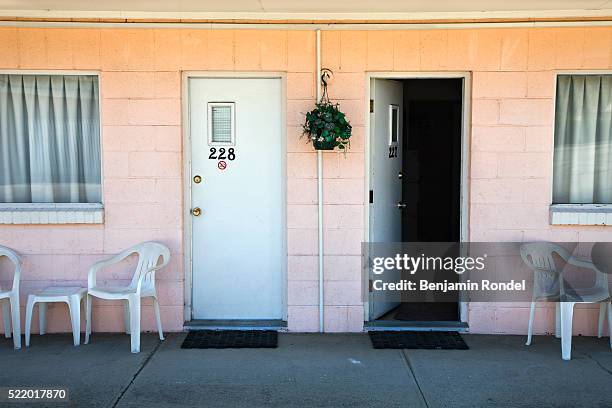 two motel room doors - blocco di cemento foto e immagini stock