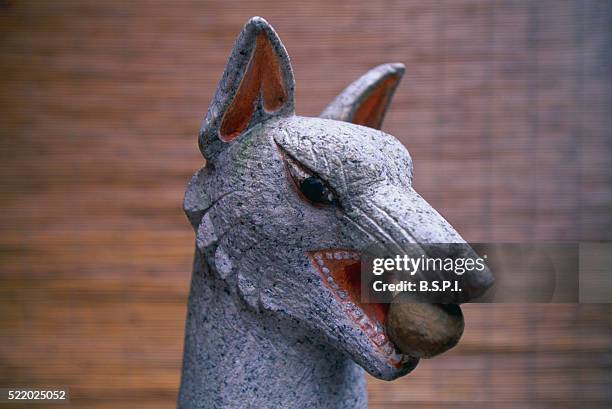 fox statue in front of tosa inari misaki shrine - tosa city stock pictures, royalty-free photos & images