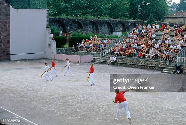 men playing jai alai - baskenland stock-fotos und bilder
