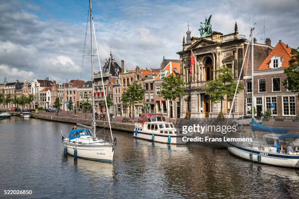 netherlands, haarlem, teylers museum, along river called het spaarne - haarlem netherlands stock pictures, royalty-free photos & images