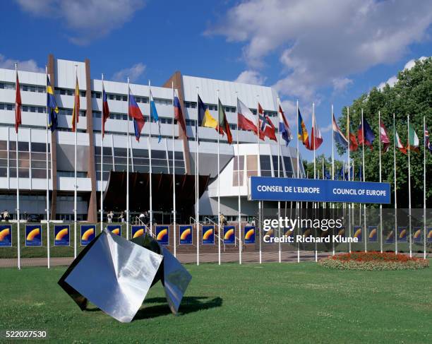 flags and sculpture outside council of europe building - europarådet bildbanksfoton och bilder