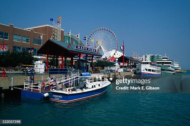 boats docked at navy pier park - navy pier stock pictures, royalty-free photos & images